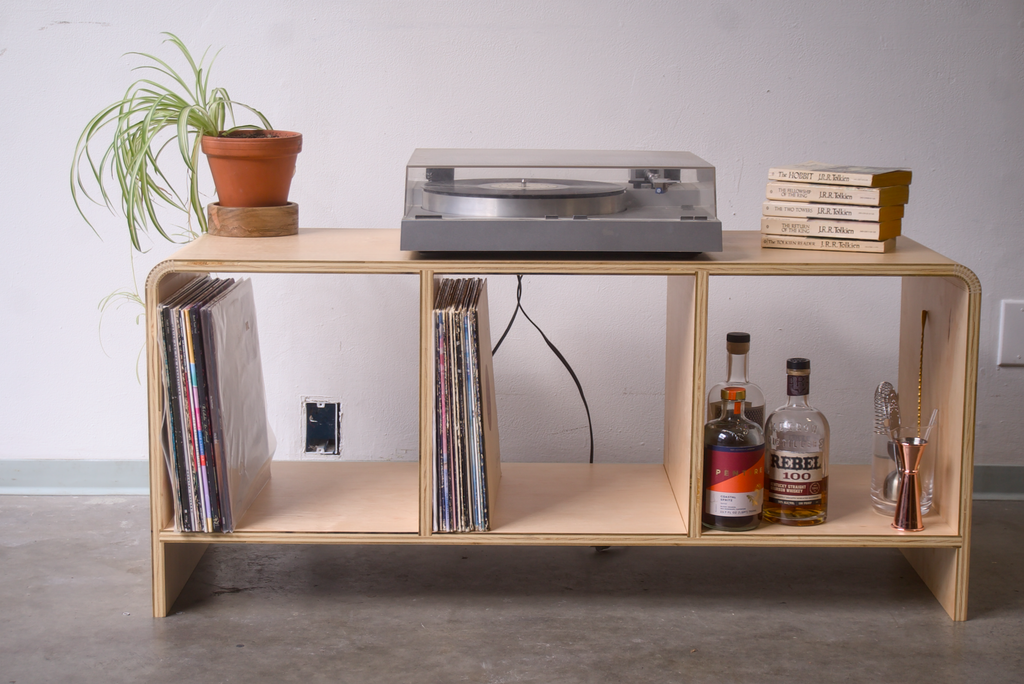 Maple Kerf Bent Record Console & made out of plywood, to house vinyl storage, bottles, and books.